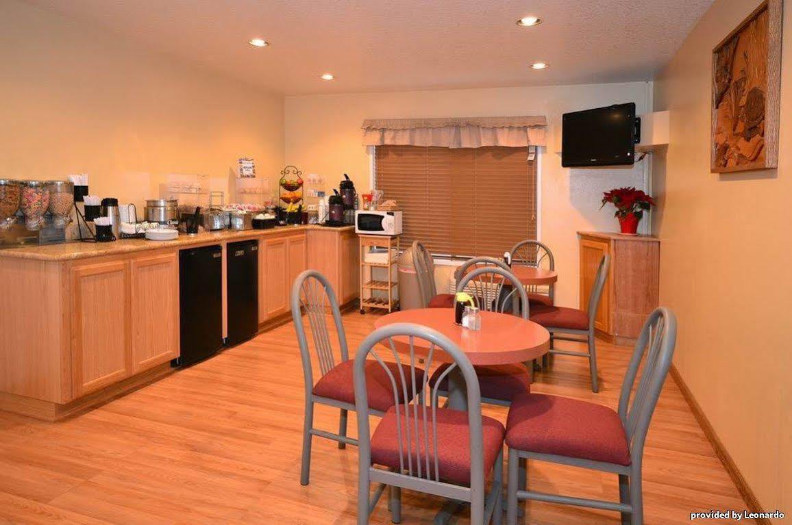 Oakridge Inn & Suites المطعم الصورة